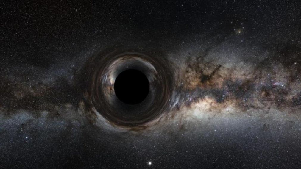 Simulaci�n de un agujero negro supermasivo creada por la NASA para mostrar distorsiona la regi�n estrellada y captura la luz, creando la silueta de agujero negro.