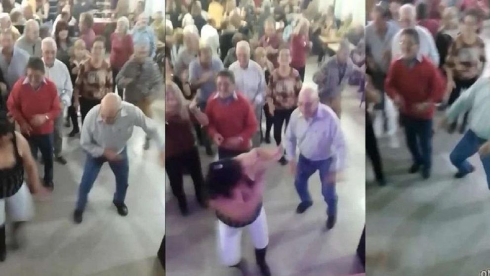 Estaba muy feliz bailando con una chica, cuando apareci� su esposa y se lo llev� de la oreja (Captura de pantalla).