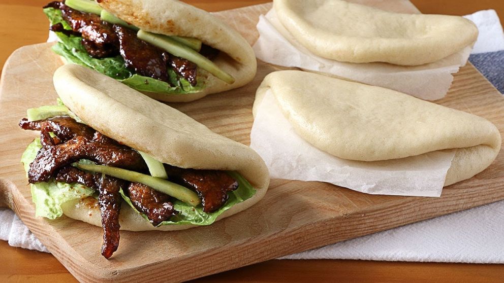 El significado de bao es "envolver", de aquí se explica la forma del pan.