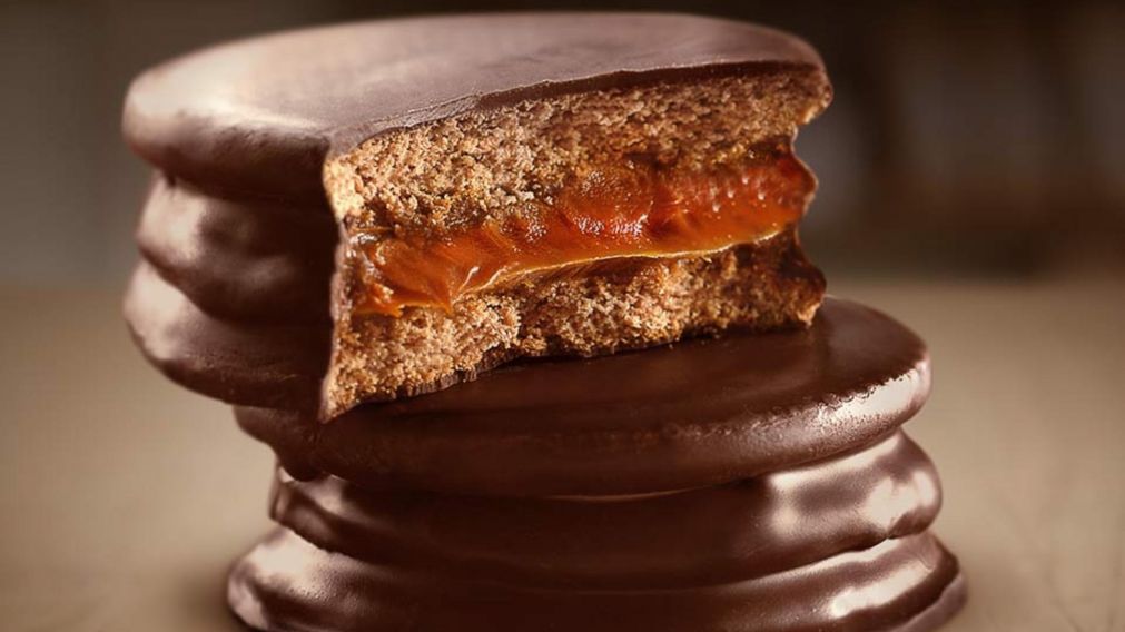 La empresa de los icónicos alfajores buscaría mejorar la calidad de sus productos con el nuevo trigo modificado, pero el acuerdo recibió duras críticas en las redes sociales.