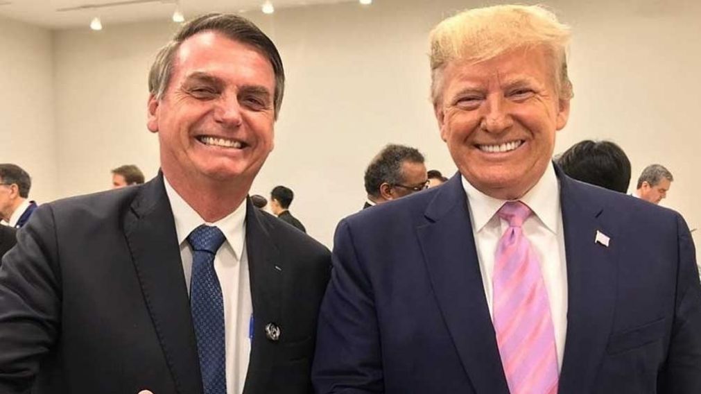 Jair Bolsonaro y Donald Trump, presidentes de Brasil y Estados Unidos, sonriendo para las cámaras (Télam/Archivo).