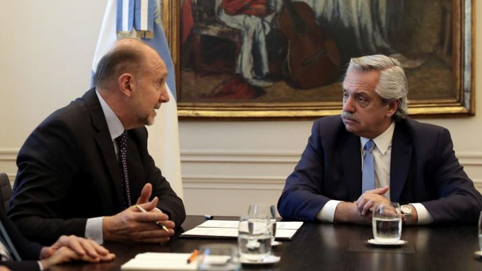 Perotti, junto a Fernández.