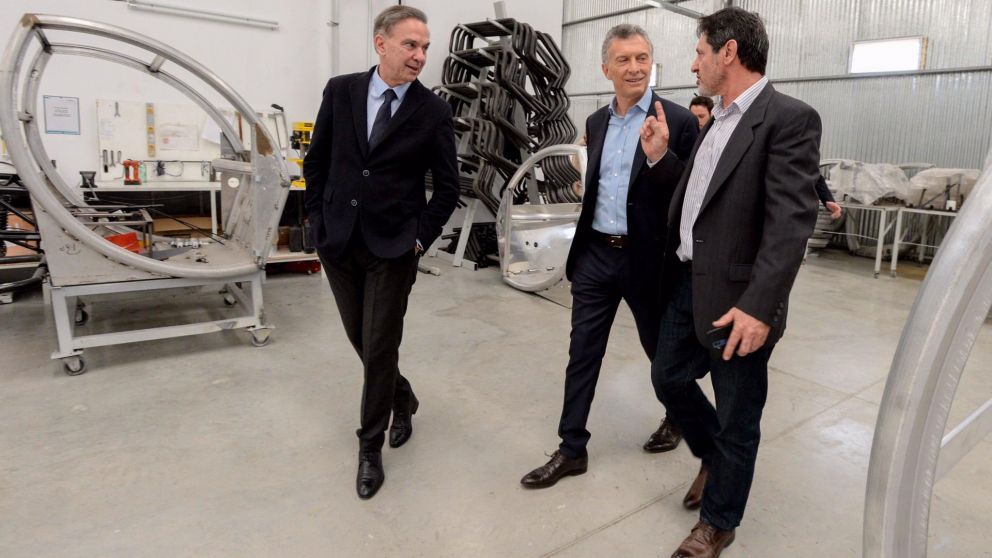 El presidente y su candidato a vice, Miguel Ángel Pichetto, en el acto.