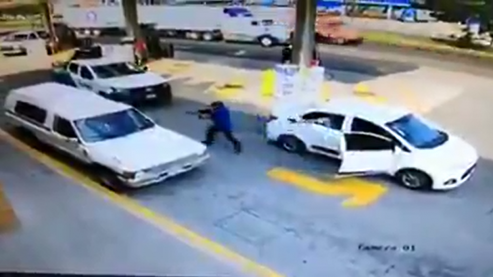 El momento donde balean a la víctima.