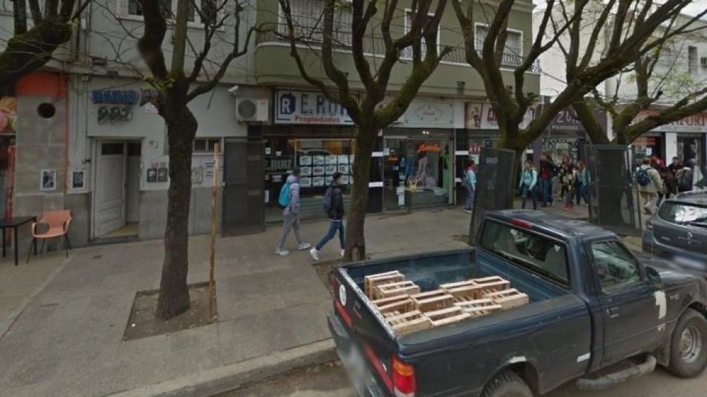 La inmobiliaria asaltada por los agentes.