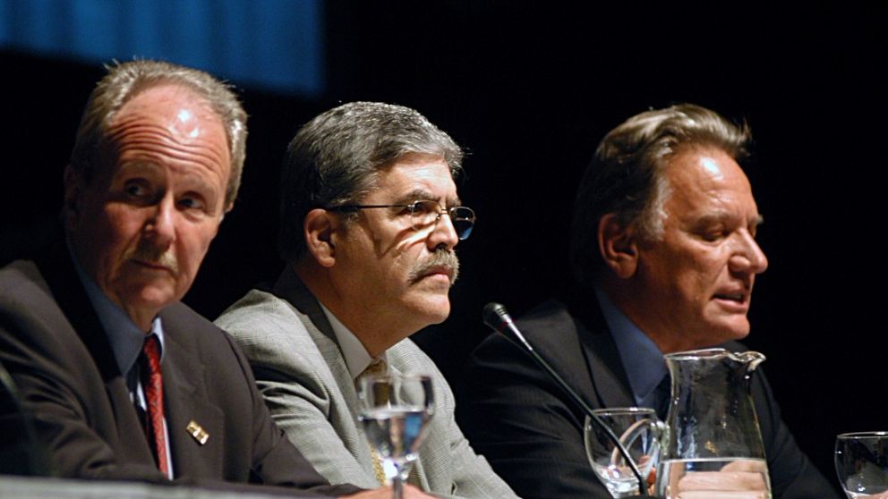 Carlos Wagner y Aldo Roggio en 2014, flanqueando al entonces ministro Julio De Vido.