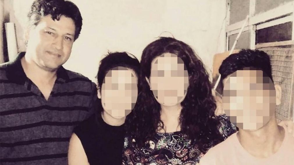 Pablo Retamar, la víctima, junto a su familia.