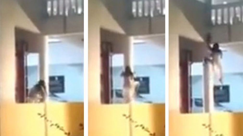 Así trepaba la mujer poseída. (Captura de video9