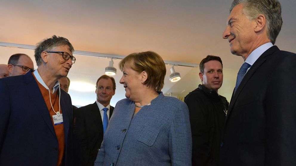 Gates, Merkel, Macri. Juntos en la cumbre de Davos.