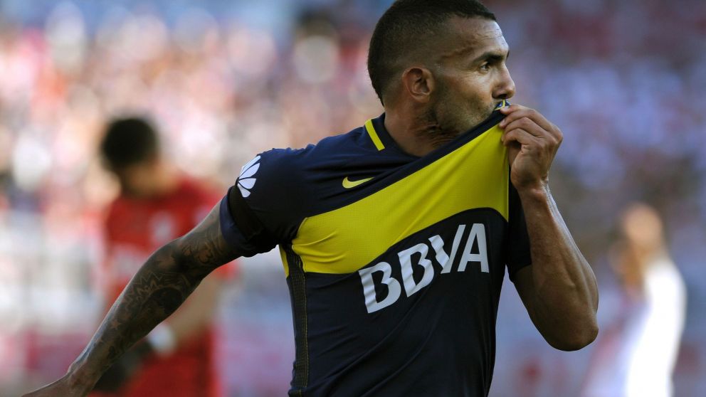 Tevez�y Boca se asociaron para resarcir a Shanghai. (AFP)
