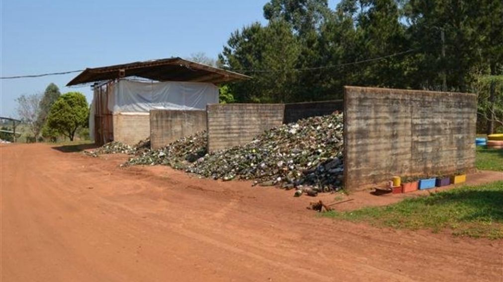 Hallan asesinada a mujer en planta recicladora de basura