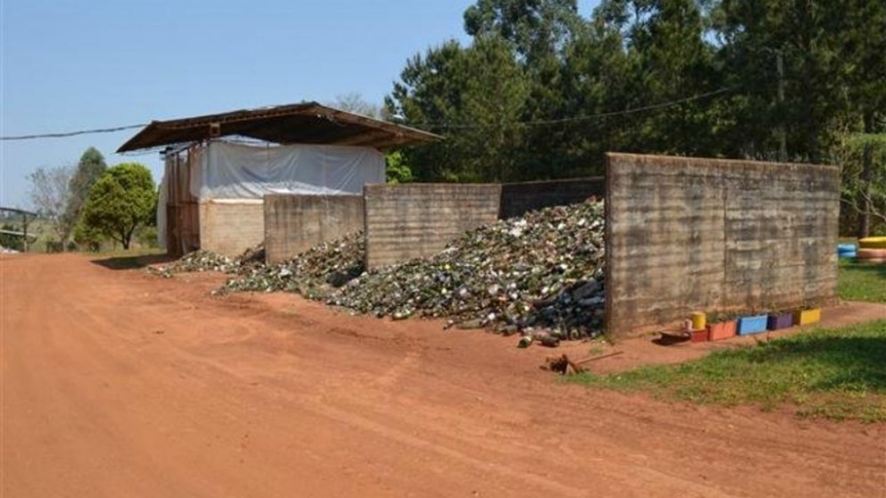 Hallan asesinada a mujer en planta recicladora de basura