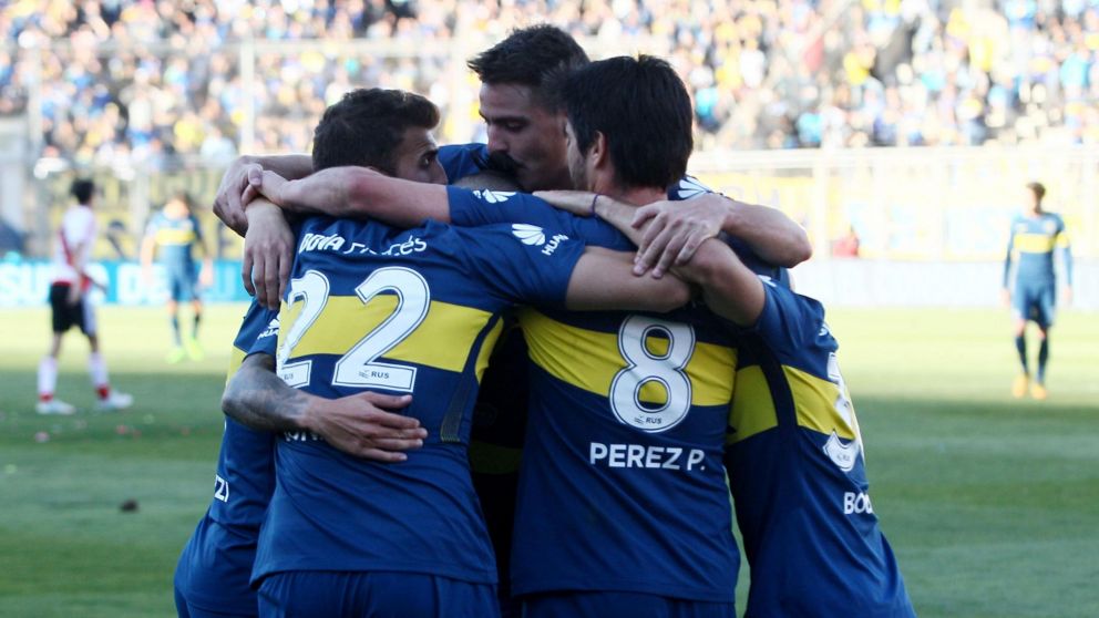 El Xeneize festeja con todo el triunfo (Télam).