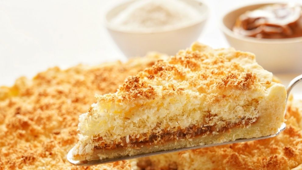Receta para preparar una exquisita tarta de coco y dulce de leche.