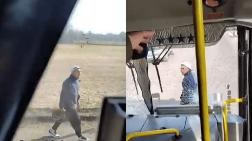 Un motociclista destruy� el parabrisas de un colectivo a golpes (Imagen captura v�deo).