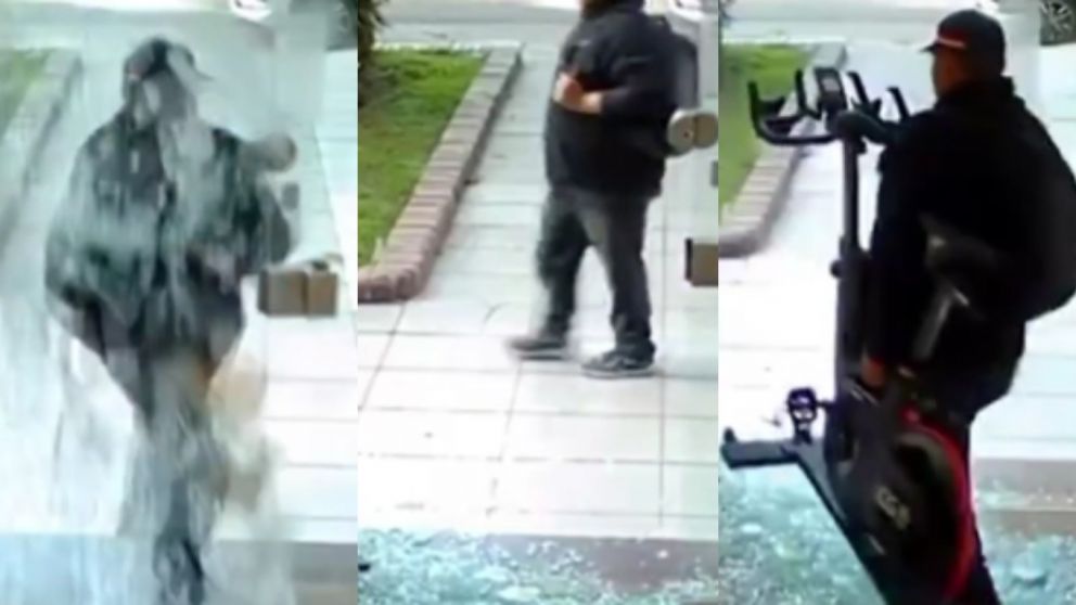Video: rompió la vidriera de un gimnasio, se hizo el distraído y se robó una bicicleta fija