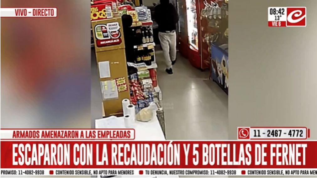 Delincuentes armados se llevaron la recaudaci�n y cinco botellas de fernet (Captura de Cr�nica HD).