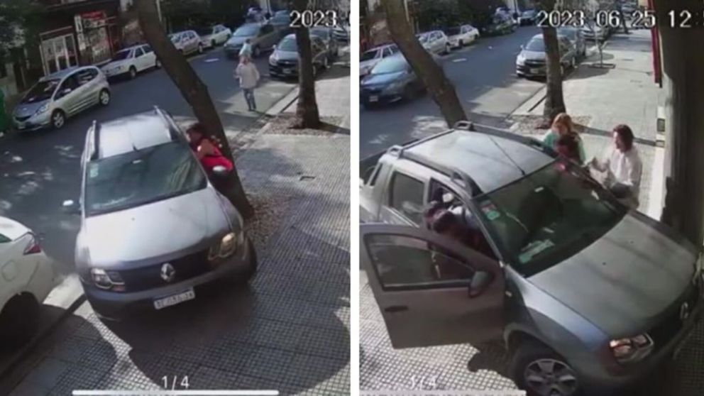 Dos mujeres se colgaron de su camioneta para evitar que unos ladrones se la robaran (Imagen captura vídeo).