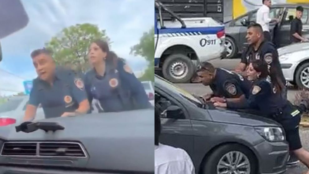 El momento crítico cuando los agentes eran arrastrados por el conductor.