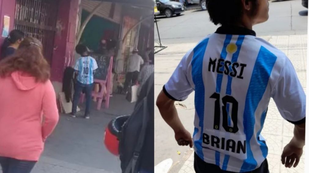 Un chico en situación de calle no tenía que ponerse y una comerciante le regaló la camiseta de la selección (Imagen TN).