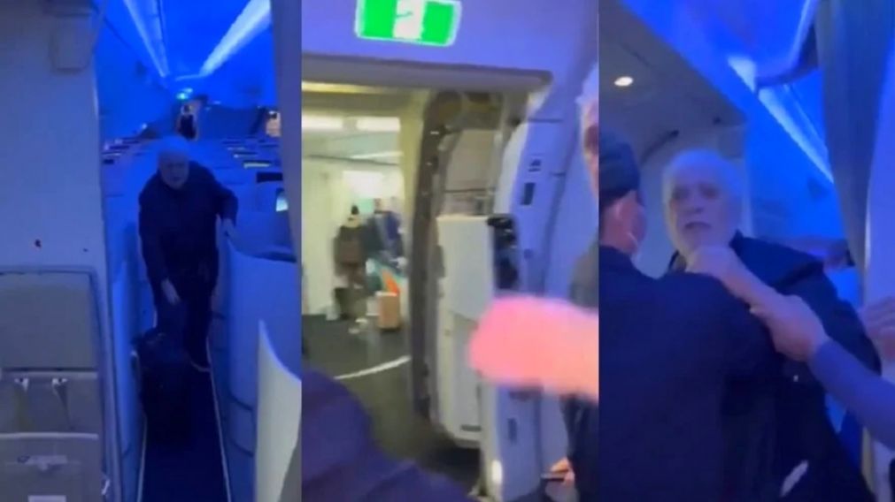 El momento en el que Gin�s Gonz�lez Garc�a es contenido por una azafata y otro pasajero (Captura de video).