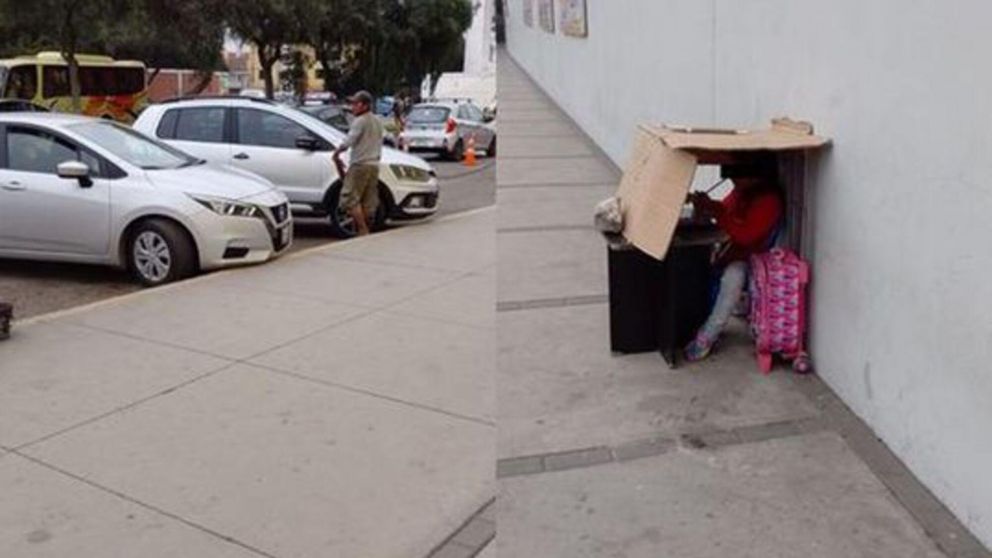El hombre en pleno trabajo informal y su hija debajo de la casita de cartones que él le hizo (Gentileza LaRepublica.pe)